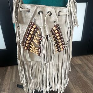 Cut n paste cream leather beaded and fringe crossbody